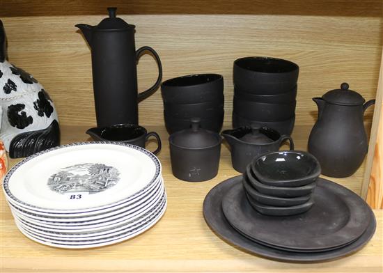 A black 1960s basalt part breakfast set and plates tallest 26cm